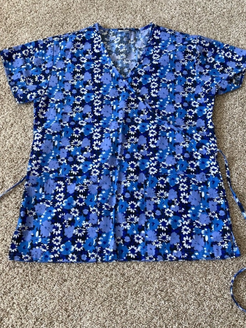 Women’s blue floral scrub top size XS
